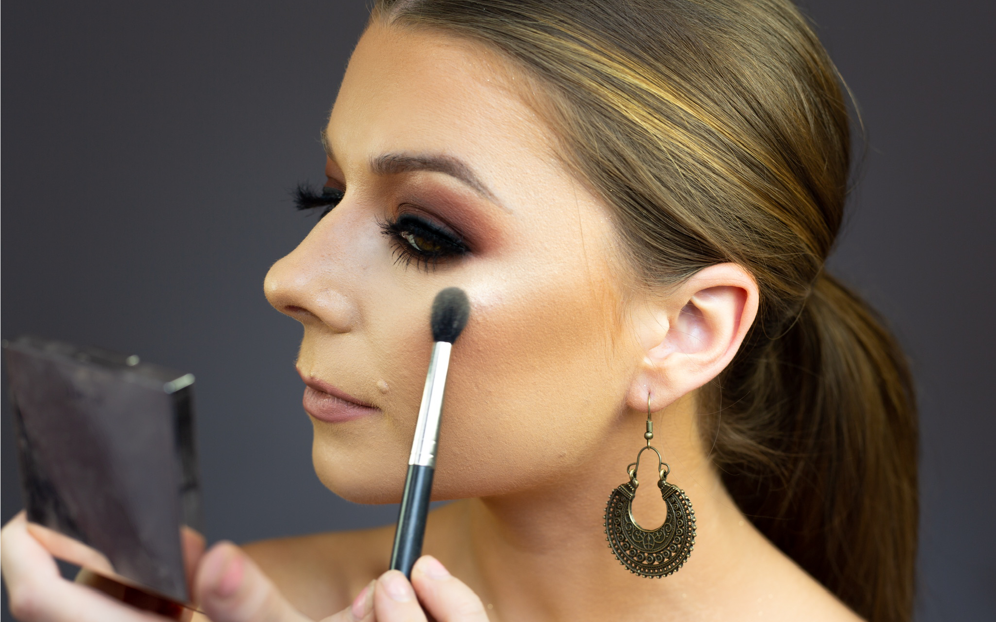 Makeup Artist Applying Makeup